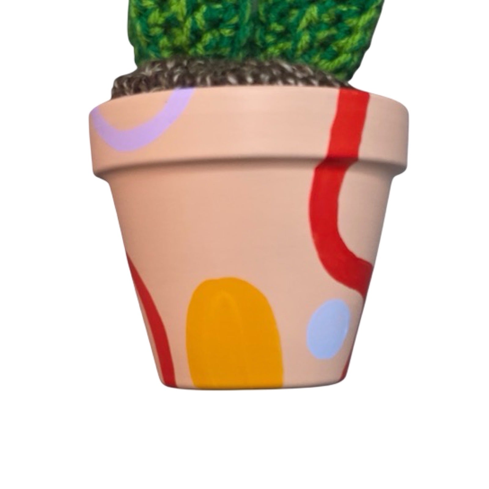 Small round crochet cactus with a purple flower.  Hand painted peach pot with colourful abstract design.