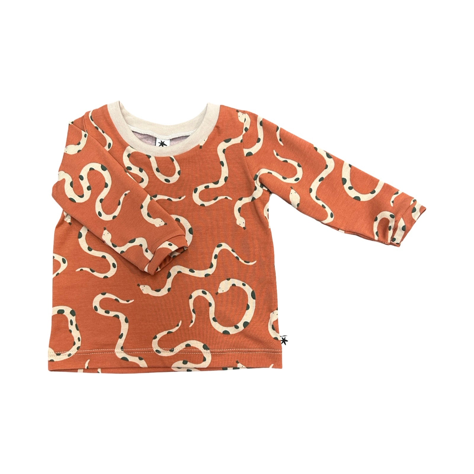 Children's long-sleeve shirt with snake pattern on a white background.