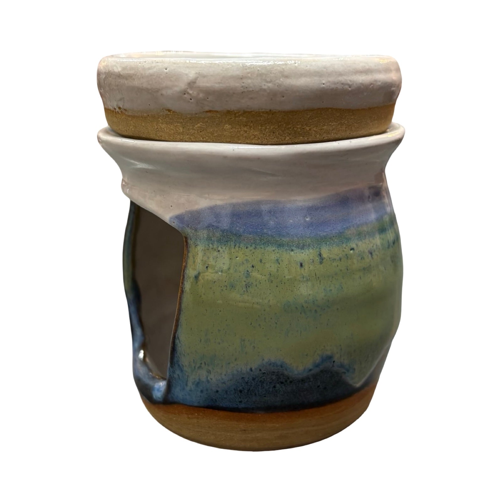 Ceramic stoneware with a lid featuring multicoloured glaze on a white background.