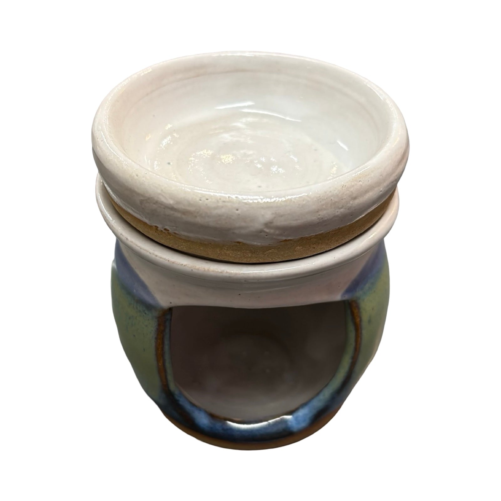 Ceramic oil burner with a white lid on a white background.
