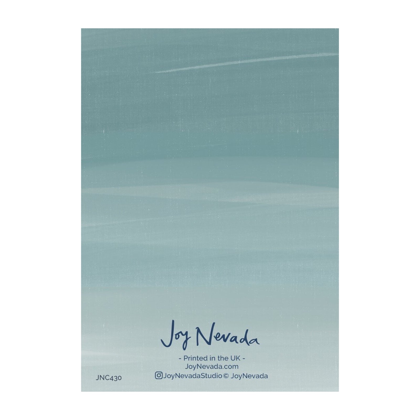 The back of a greetings card showing a blue sky.