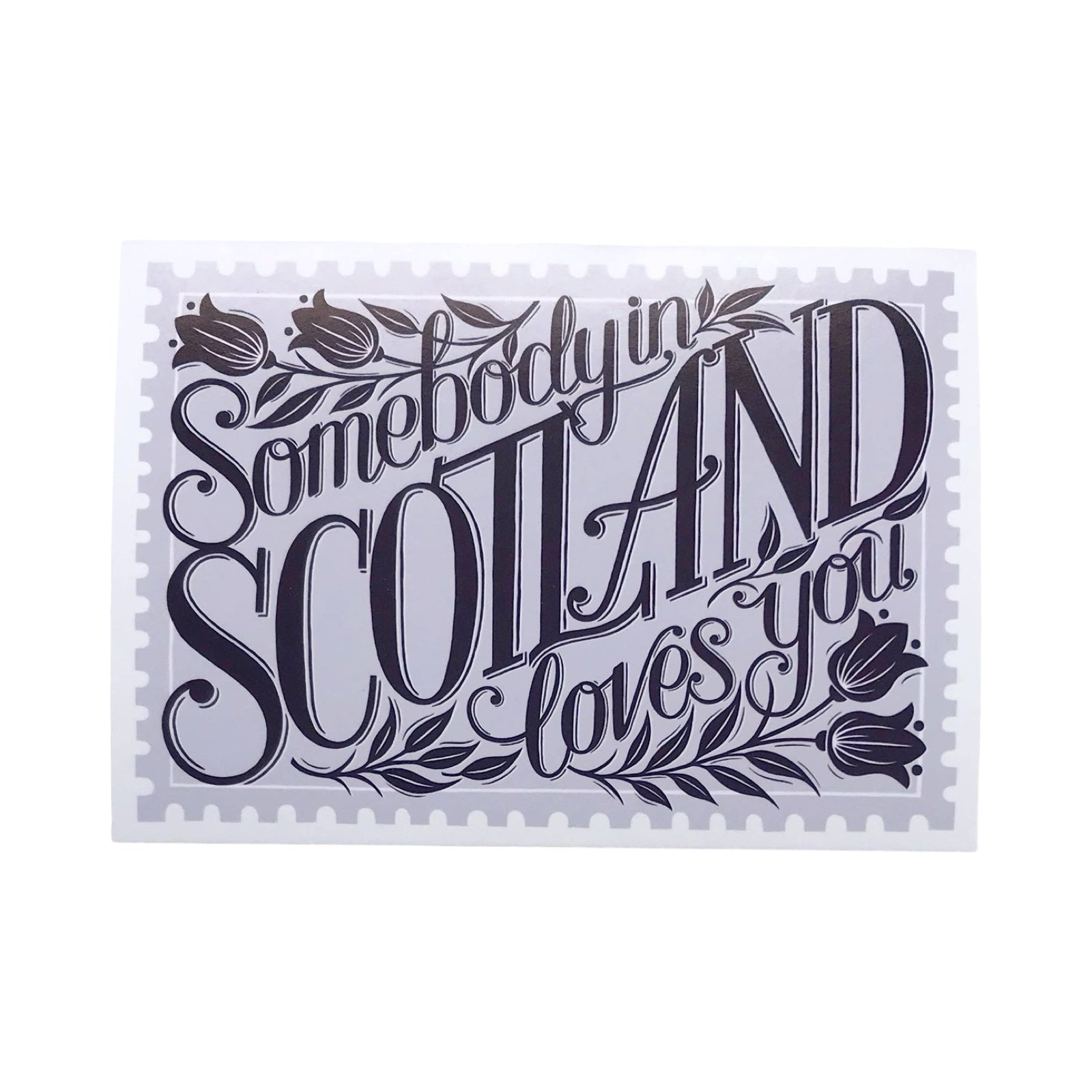 Decorative card with text 'Somebody in Scotland loves you' and floral designs on a white background.