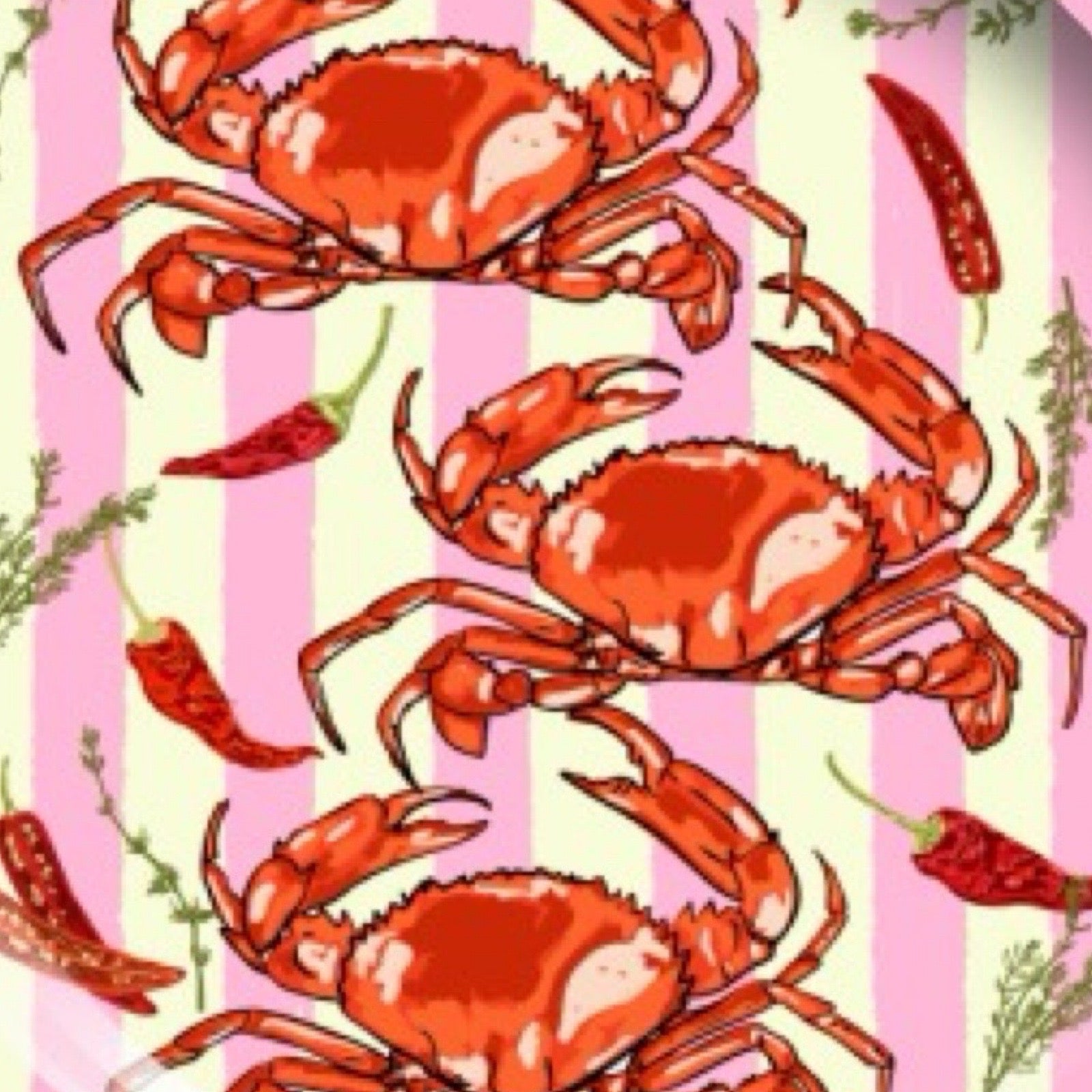 Pattern of red crabs, red peppers, and green herbs on a pink and white striped background.