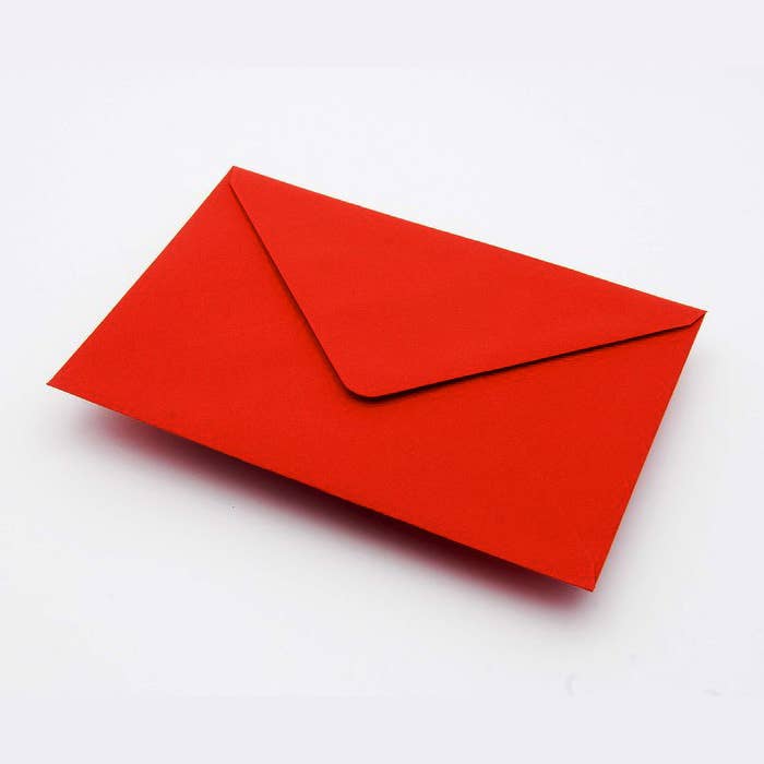 A single bright red envelope with a pointed flap, on a white background.