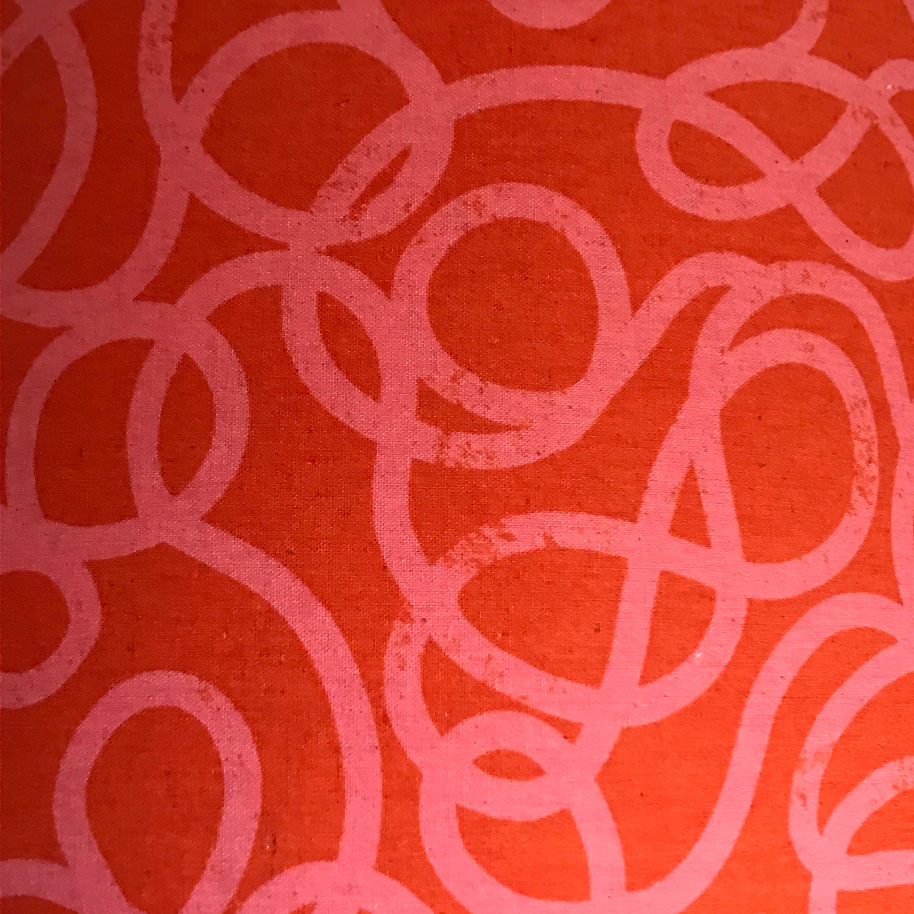Red canvas fabric with pink squiggles