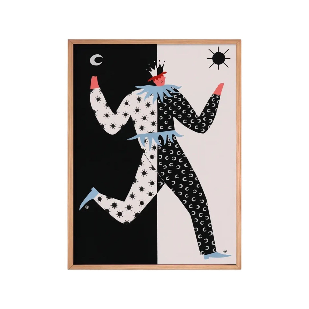 This print features an illustration of the man, half of him dressed in a white jumpsuit with black stars against a black background and the other half dressed in a black jumpsuit with white moons against a white background.
