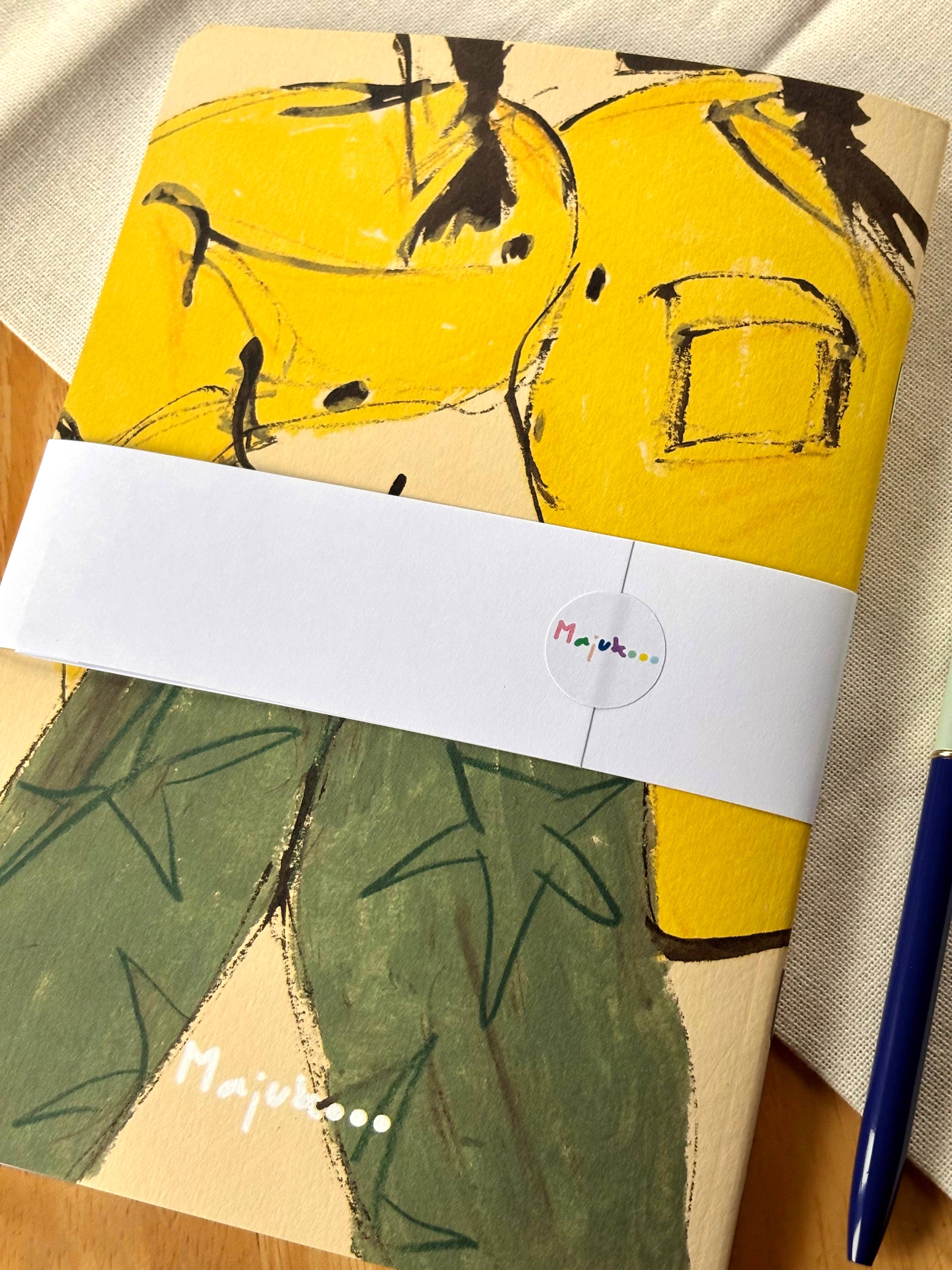 Packaged product with a yellow top and green trousers.