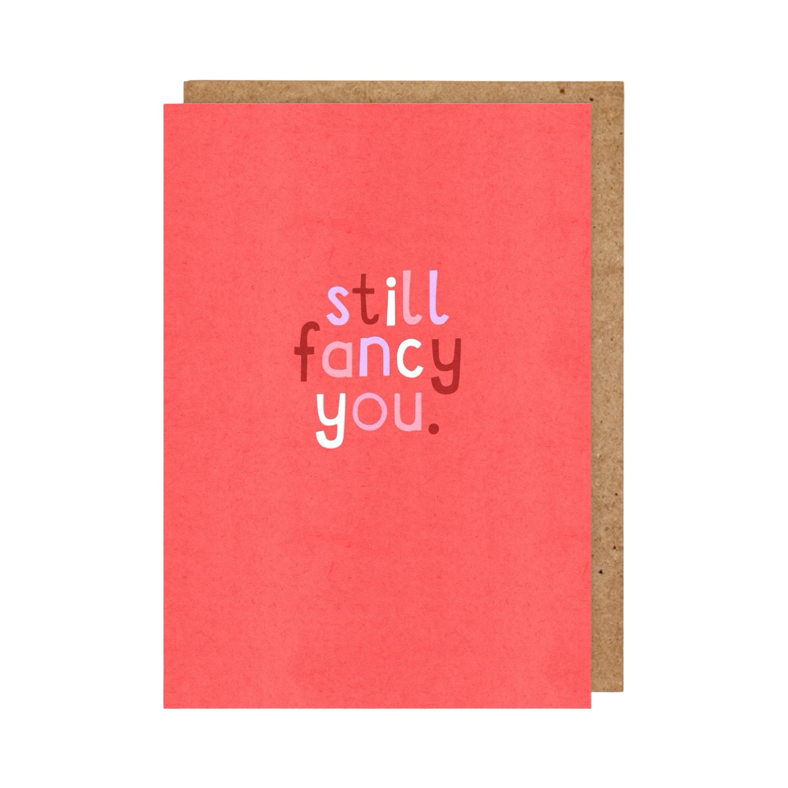 typographical card featuring the text 'still fancy you' written in red, pink and white against a red background