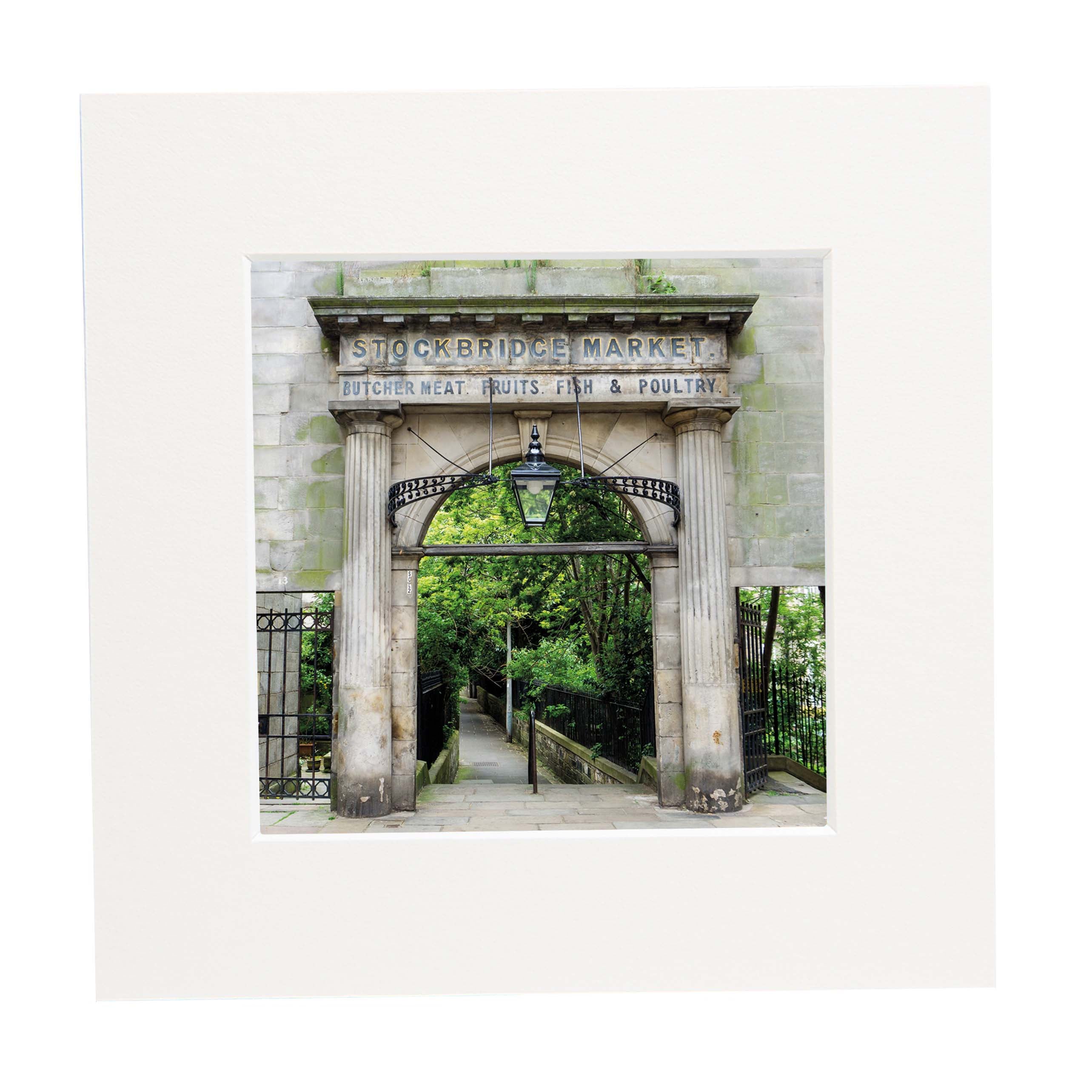 An image of the Stockbridge Market Arch in a square mount. 