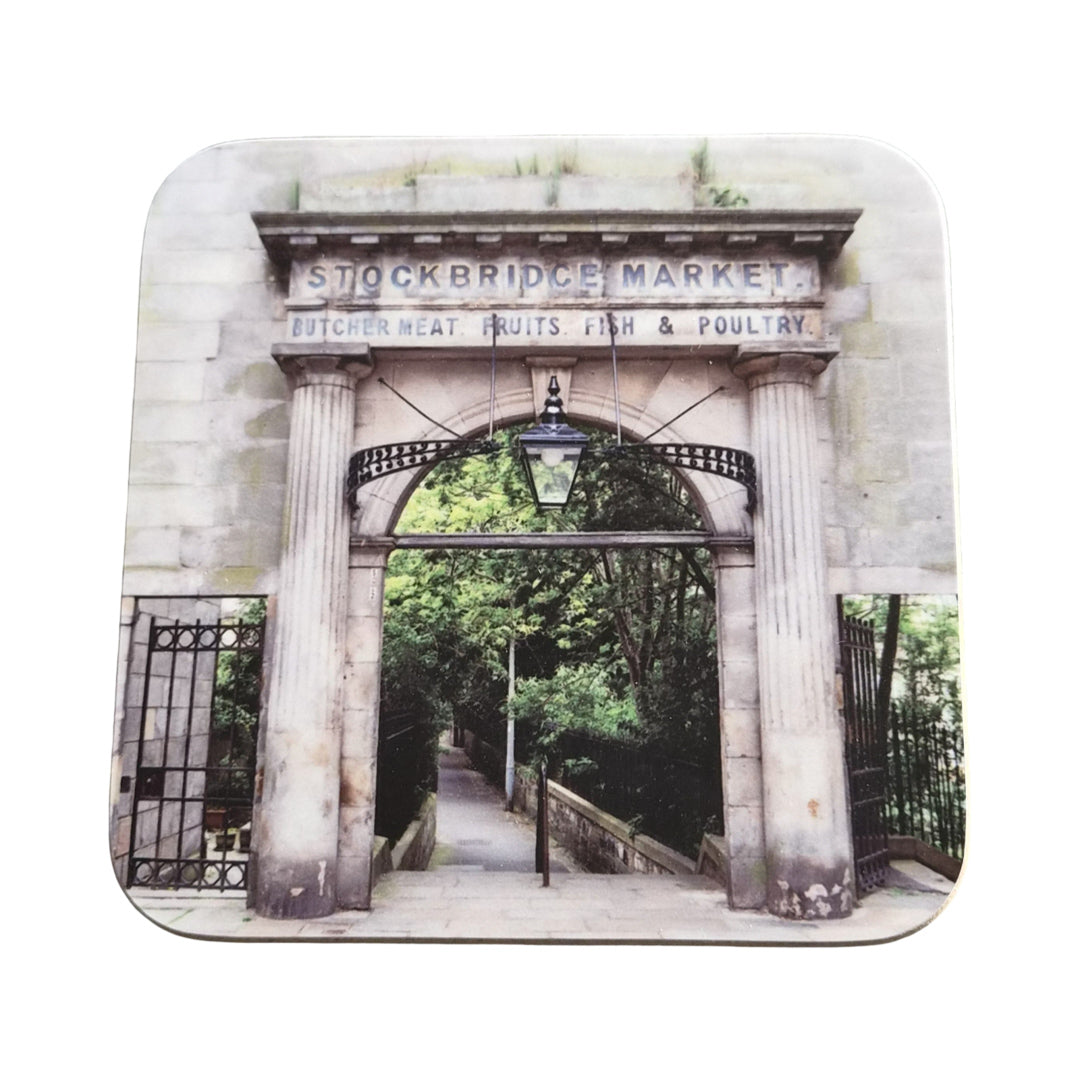 Coaster with an image of Stockbridge Market entrance on a white background