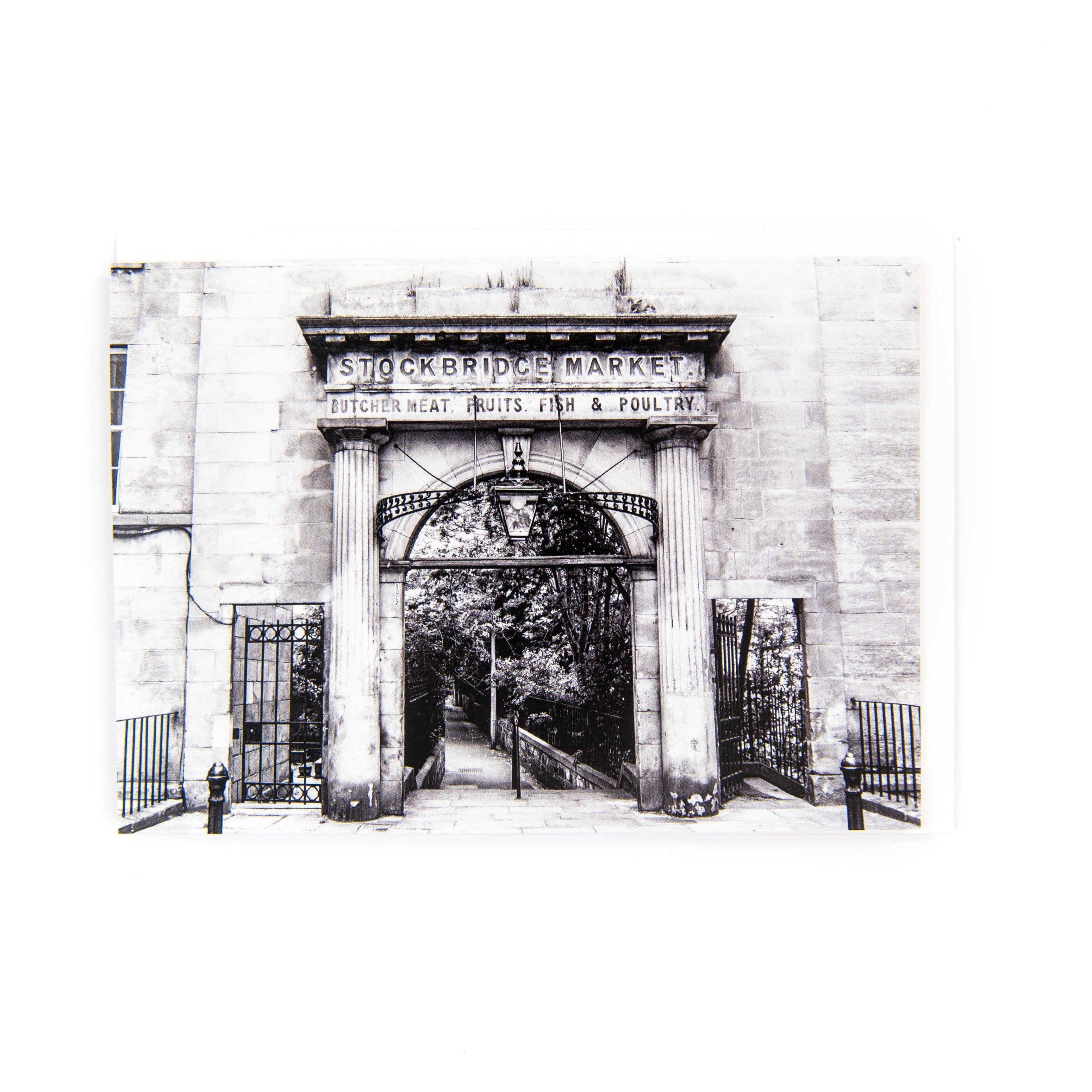 A black and white photograph of the old Stockbridge Market Arch, Edinburgh, printed on an A6 greeting card.