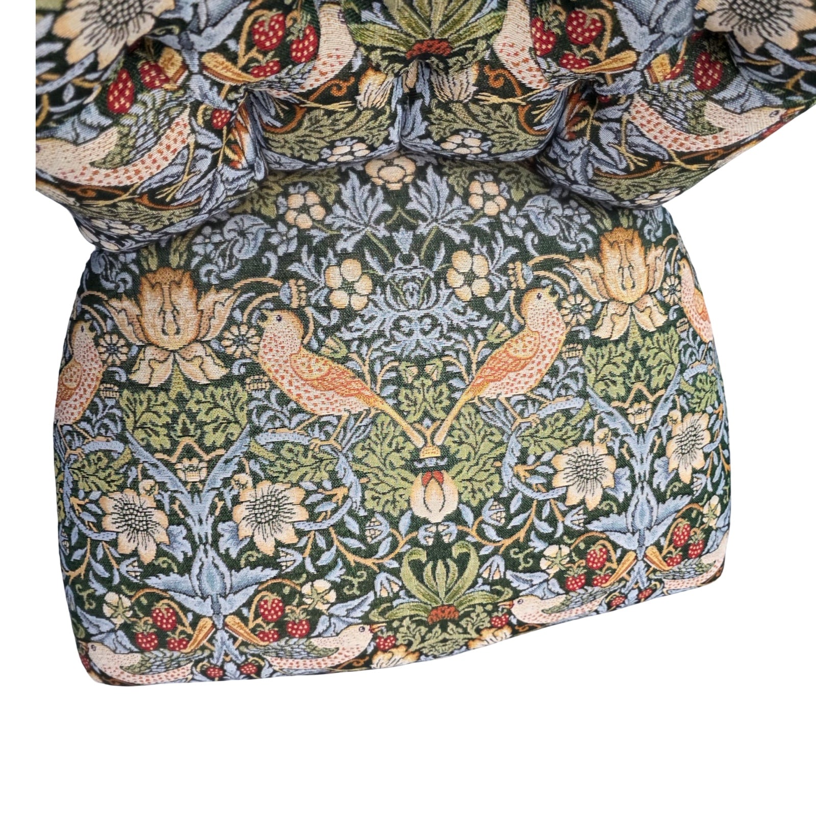 Floral and bird patterned fabric with a white background.