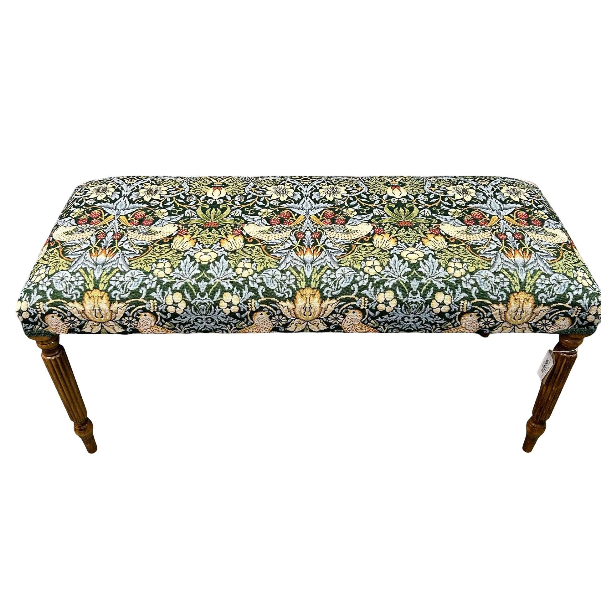 A handcrafted occasional bench with mahogany legs and a green Strawberry Thief cotton embroidery style fabric cover.