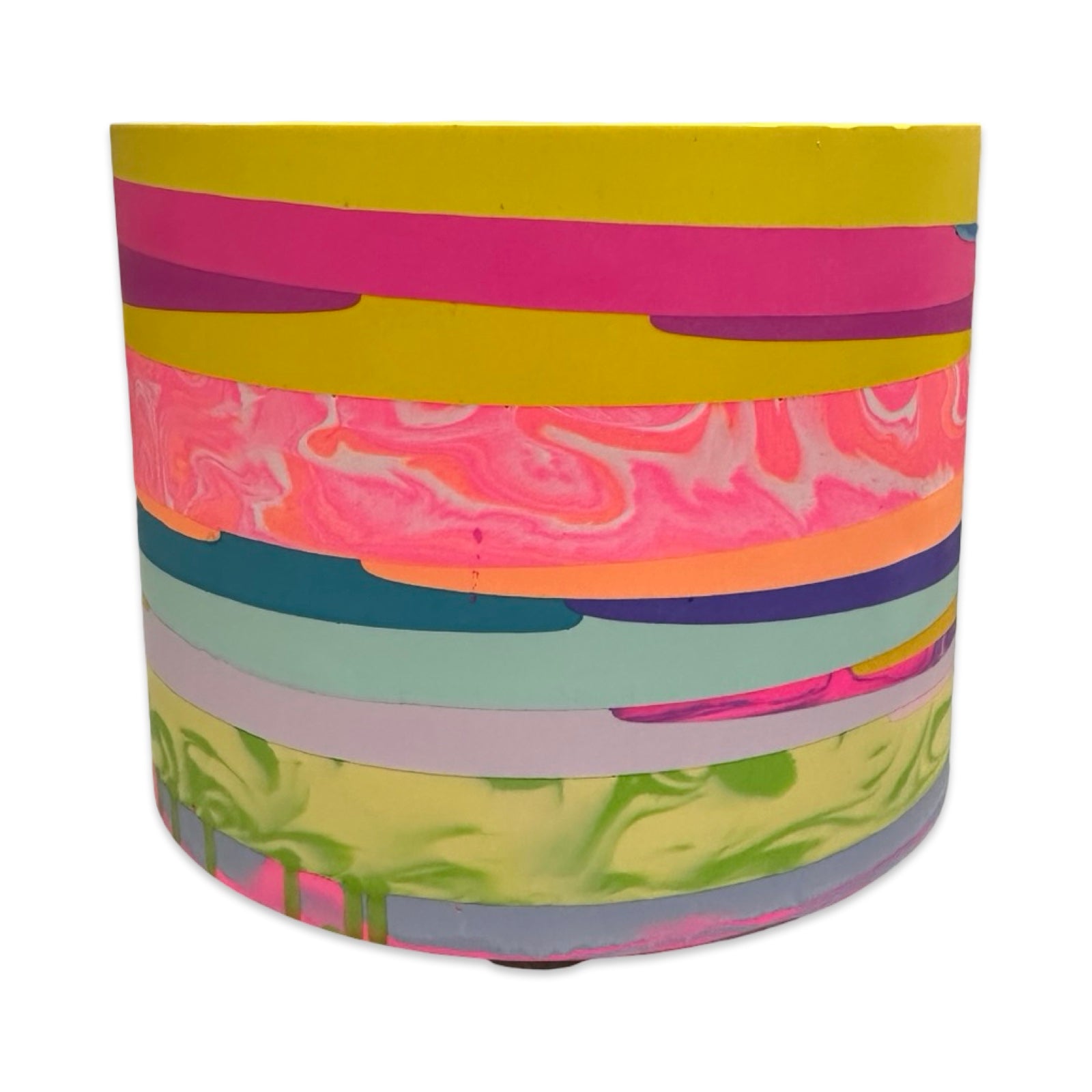 Colorful planter with abstract pattern on a white background.