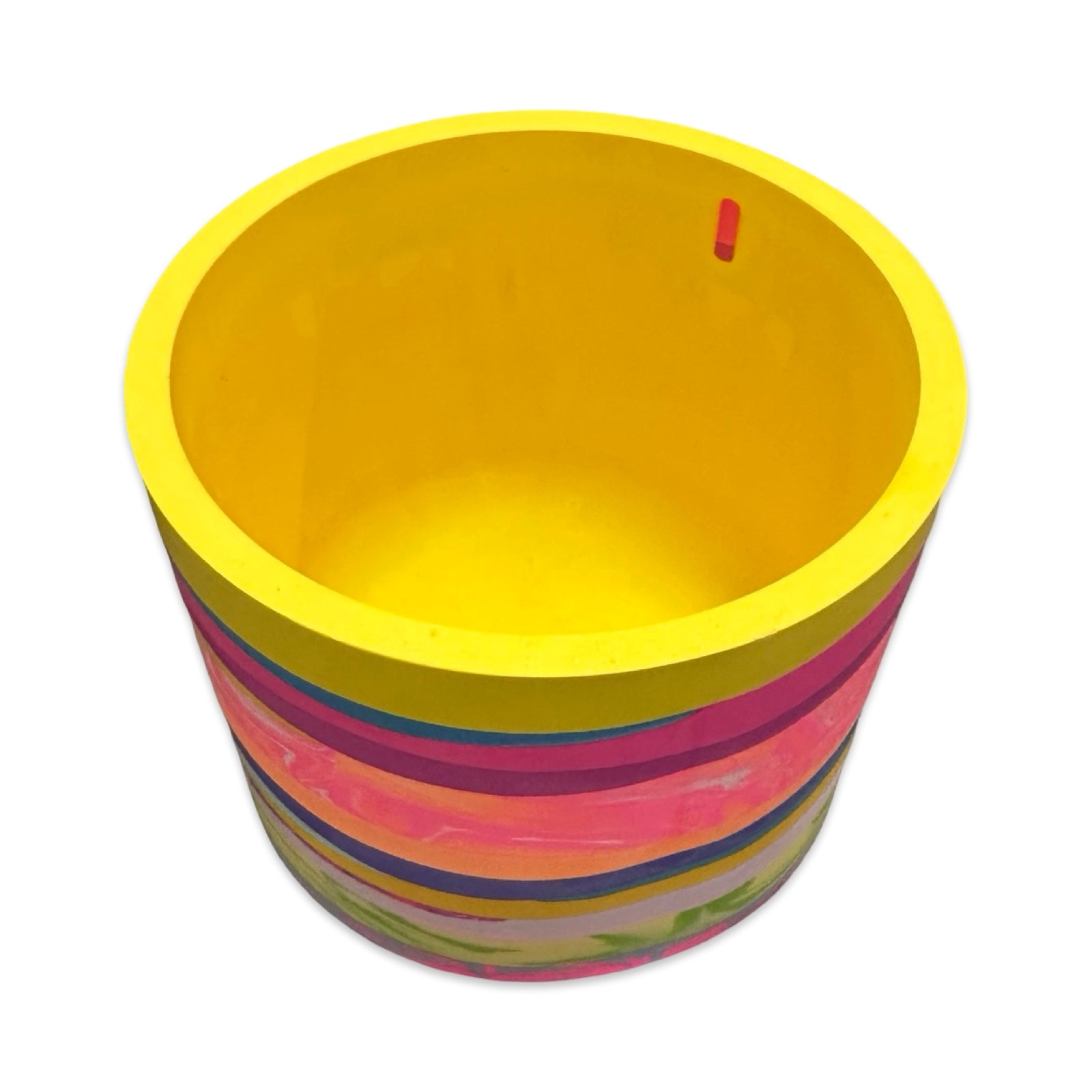 Colorful striped planter with a yellow inside on a white background.