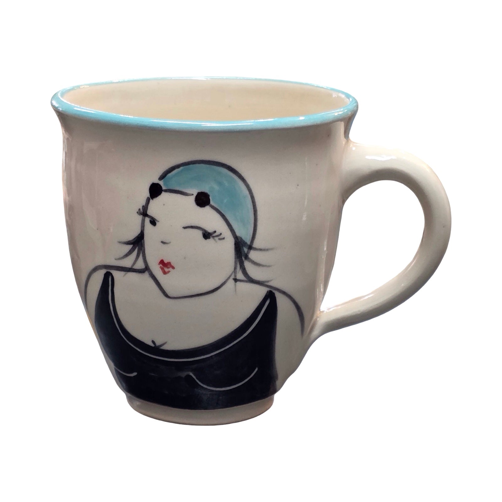 White mug with a decorative design of a woman's face on a white background.