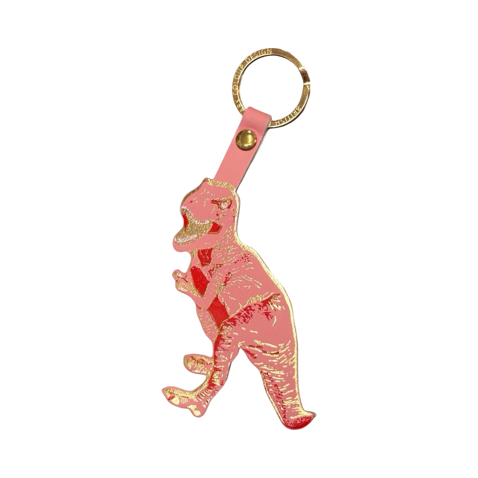 Pink and gold dinosaur keychain on a white background.