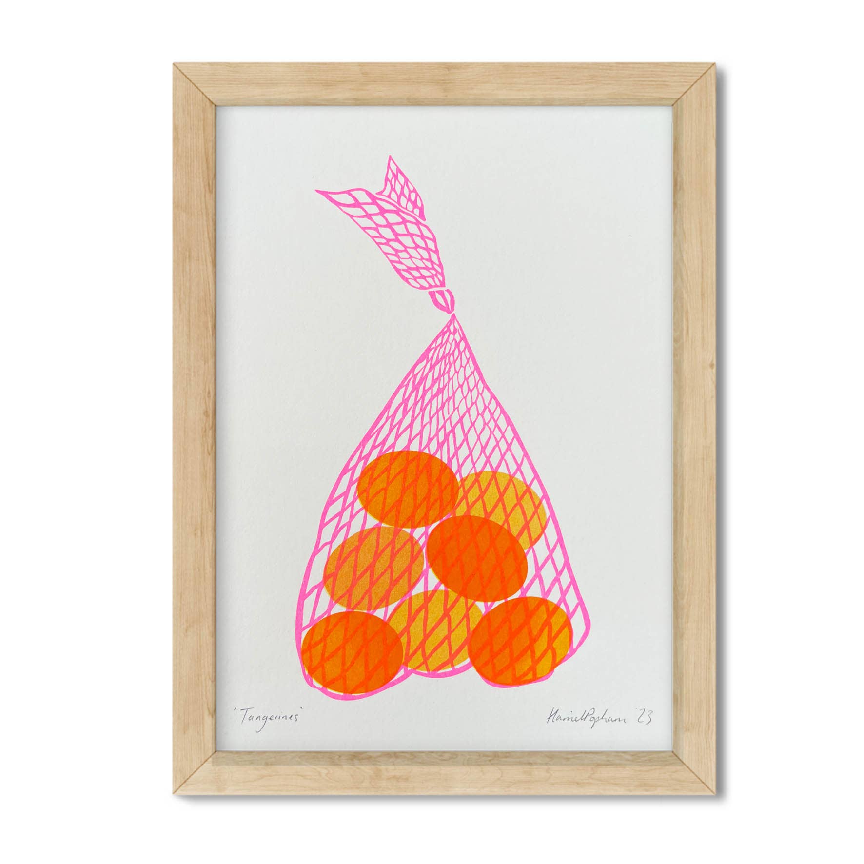 Framed artwork of a pink net bag with oranges on a white background.