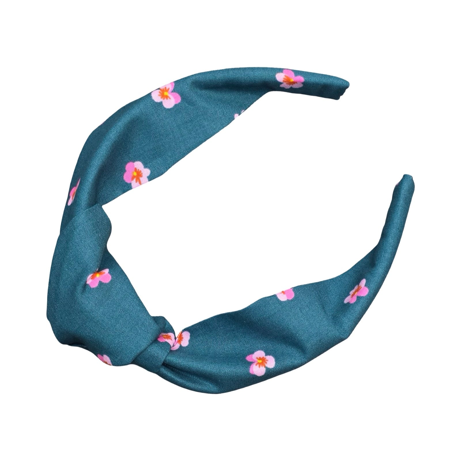 This teal handmade floral top-knot Alice band is made from 100% cotton fabric with small pink violets. 