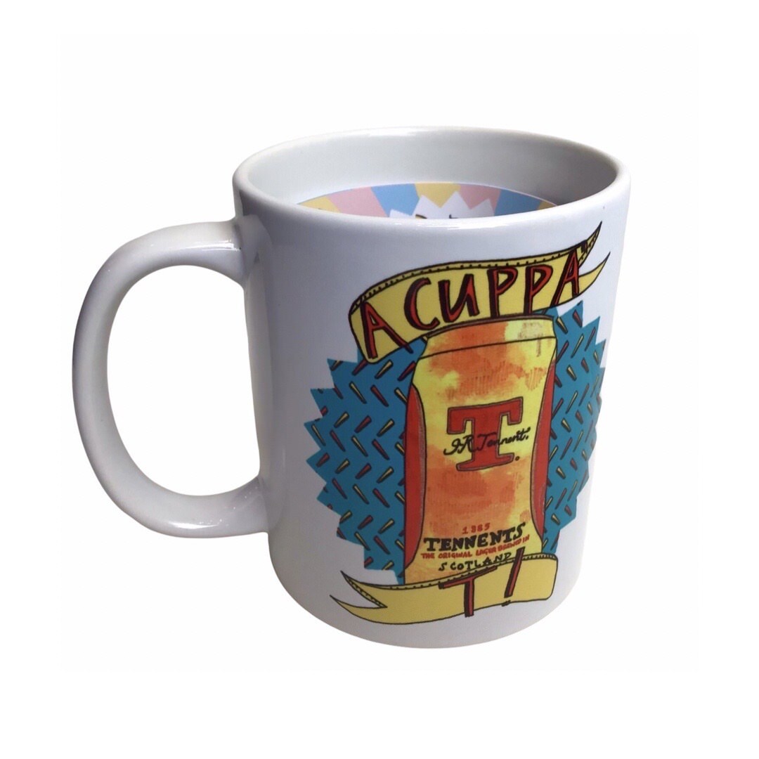Mug featuring an illustration of a can of Tennent's lager and the text 'A Cuppa' T! in banners above and below the can.