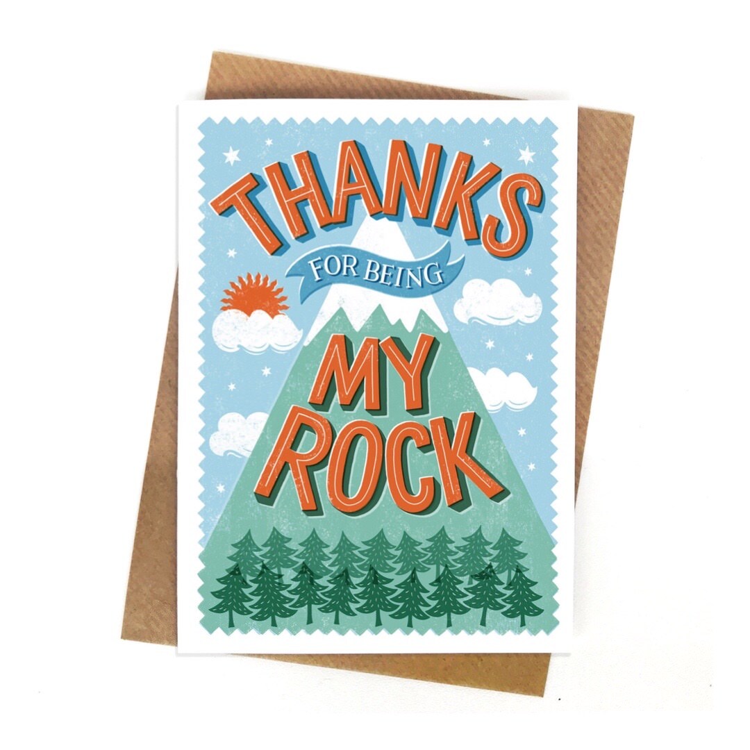 A thank you card featuring a snowy covered mountain and forest below and the text thanks for being my rock