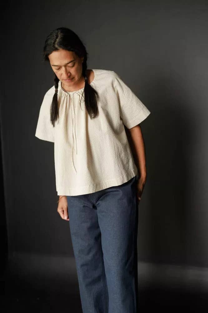 Sewing pattern for a T-shaped top or dress with a gathered drawstring neckline that can be adjusted to sit at your desired height; the pattern can be made with or without sleeves.