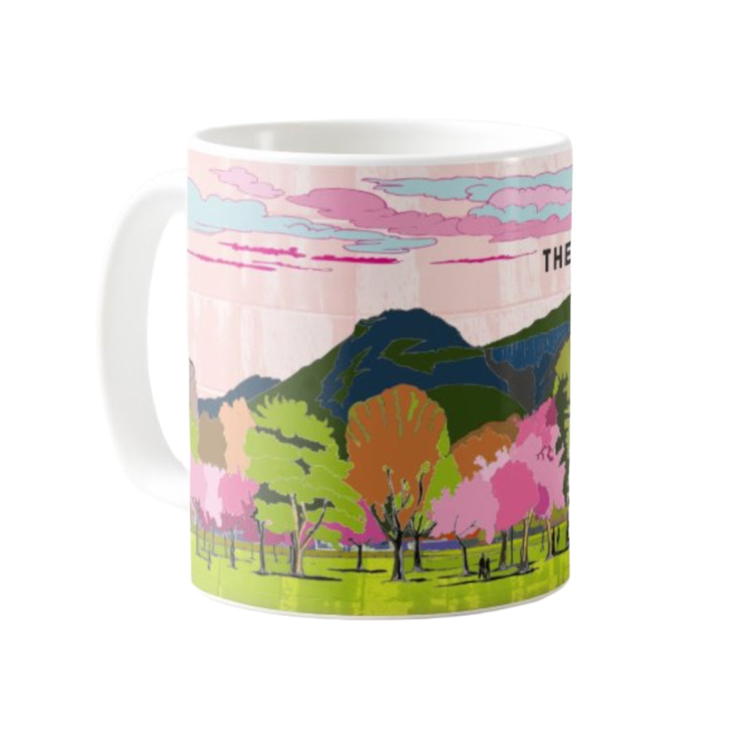 Classic mug featuring a striking panoramic artwork of The Meadows with Arthurs Seat, Edinburgh