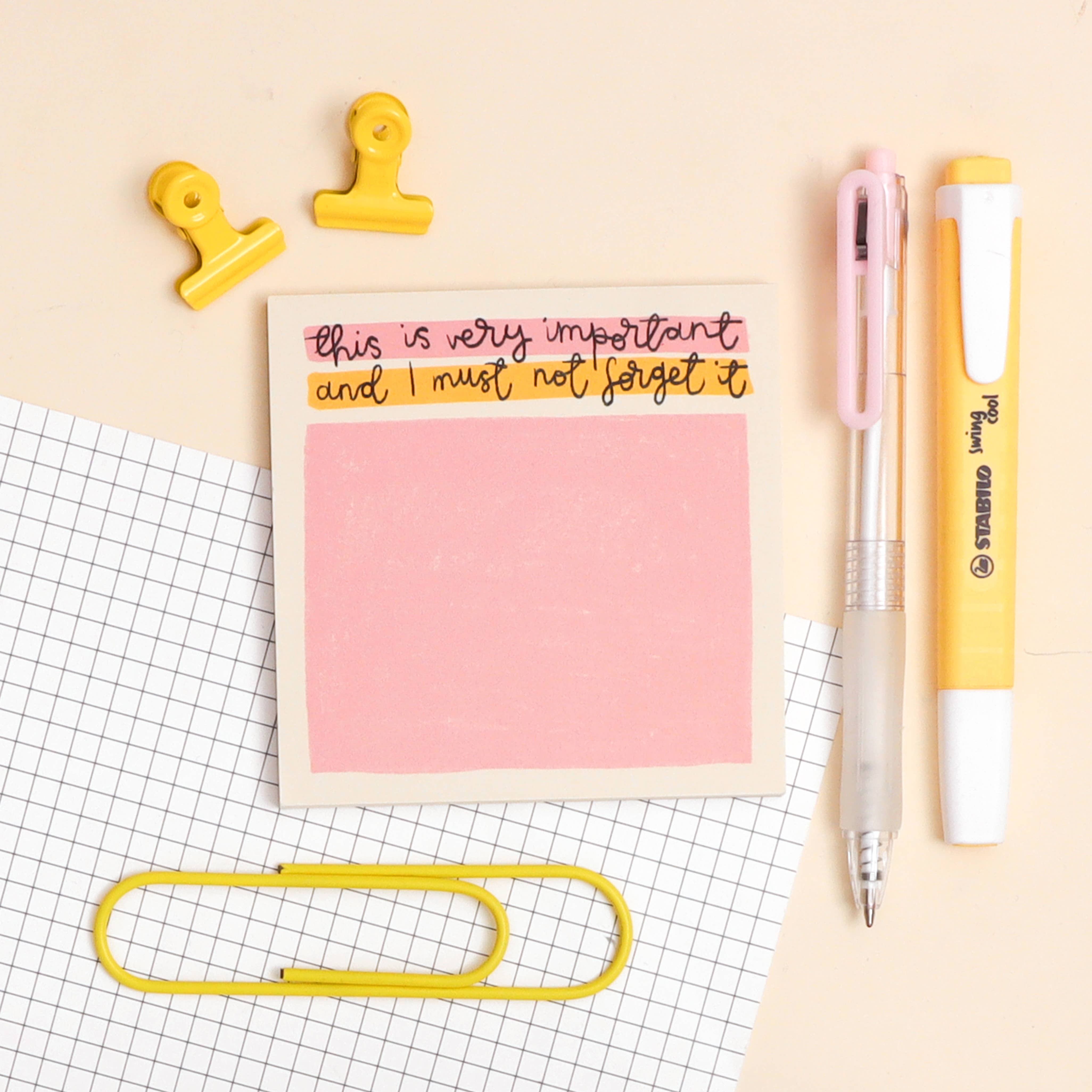 This 'this is very important' memo pad features a pink box to write in surrounded by a white border. 
