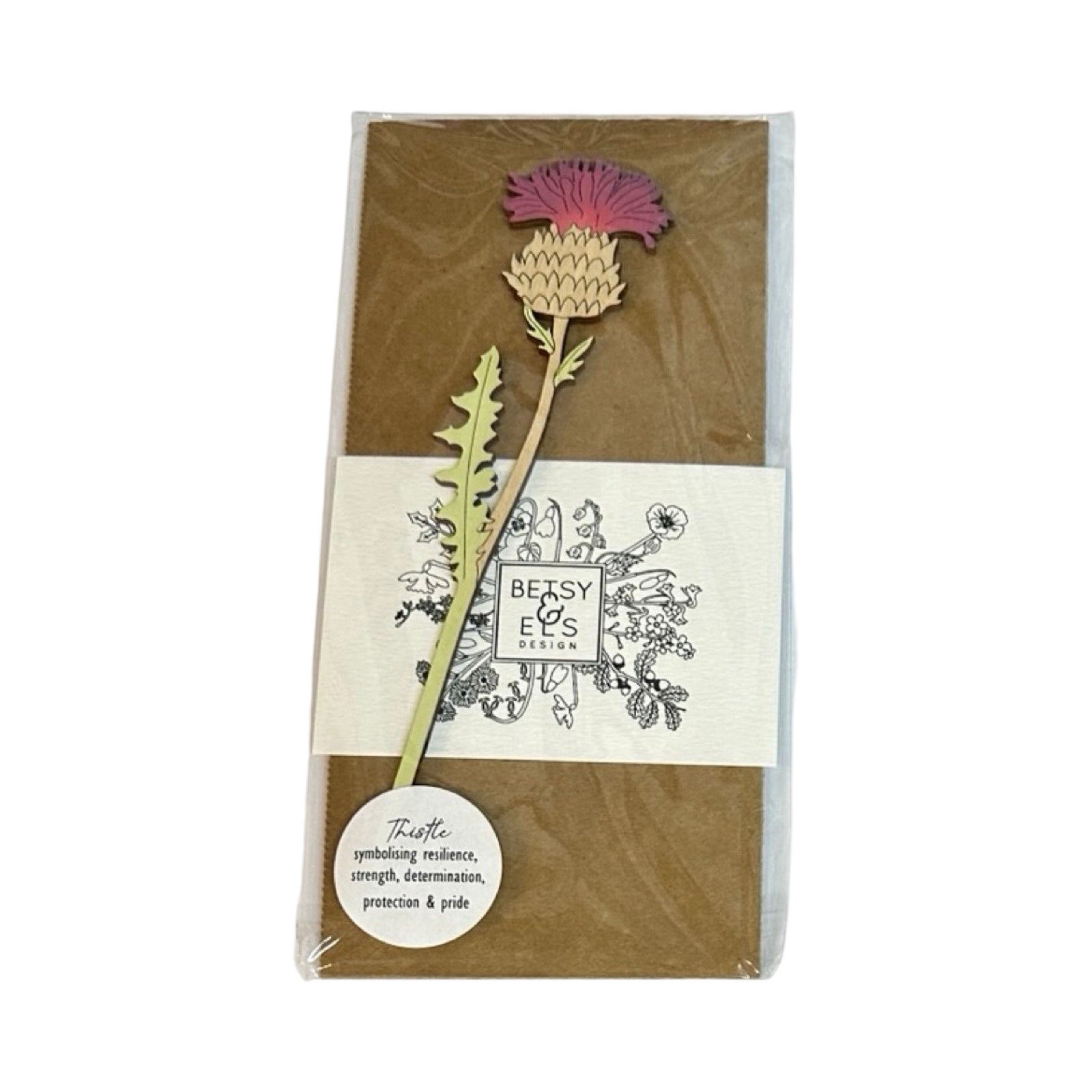 Single thistle wooden stem with purple flower in a cellophane packet