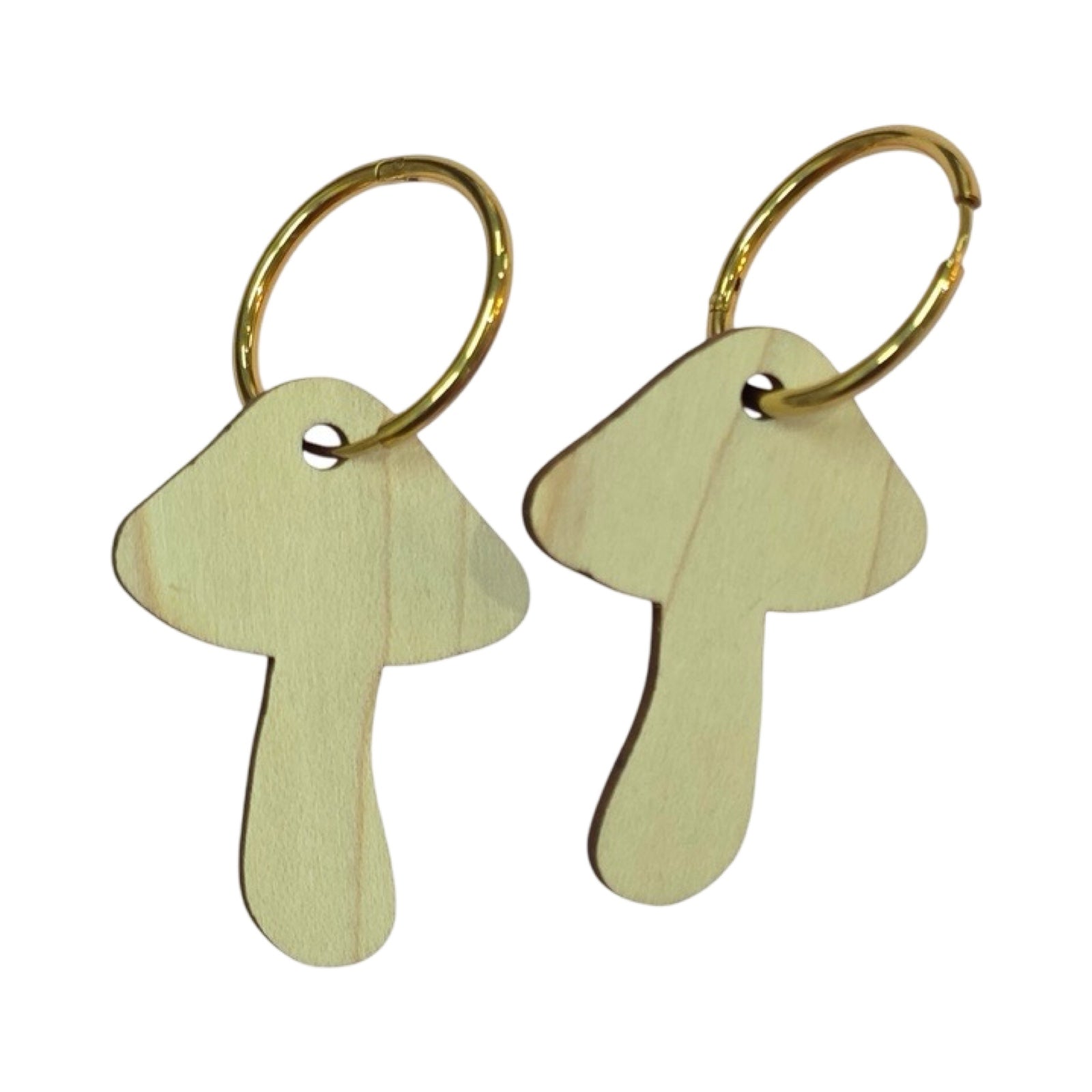 The back of a pair of wooden toadstool drop earrings showing gold coloured hoops.