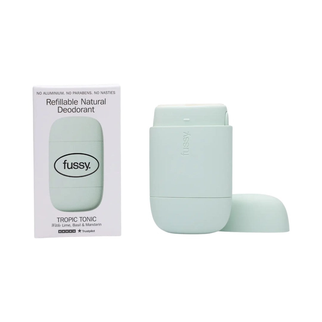 A mint refillable deodorant case and a packet of fussy Tropic Tonic refillable deodorant.