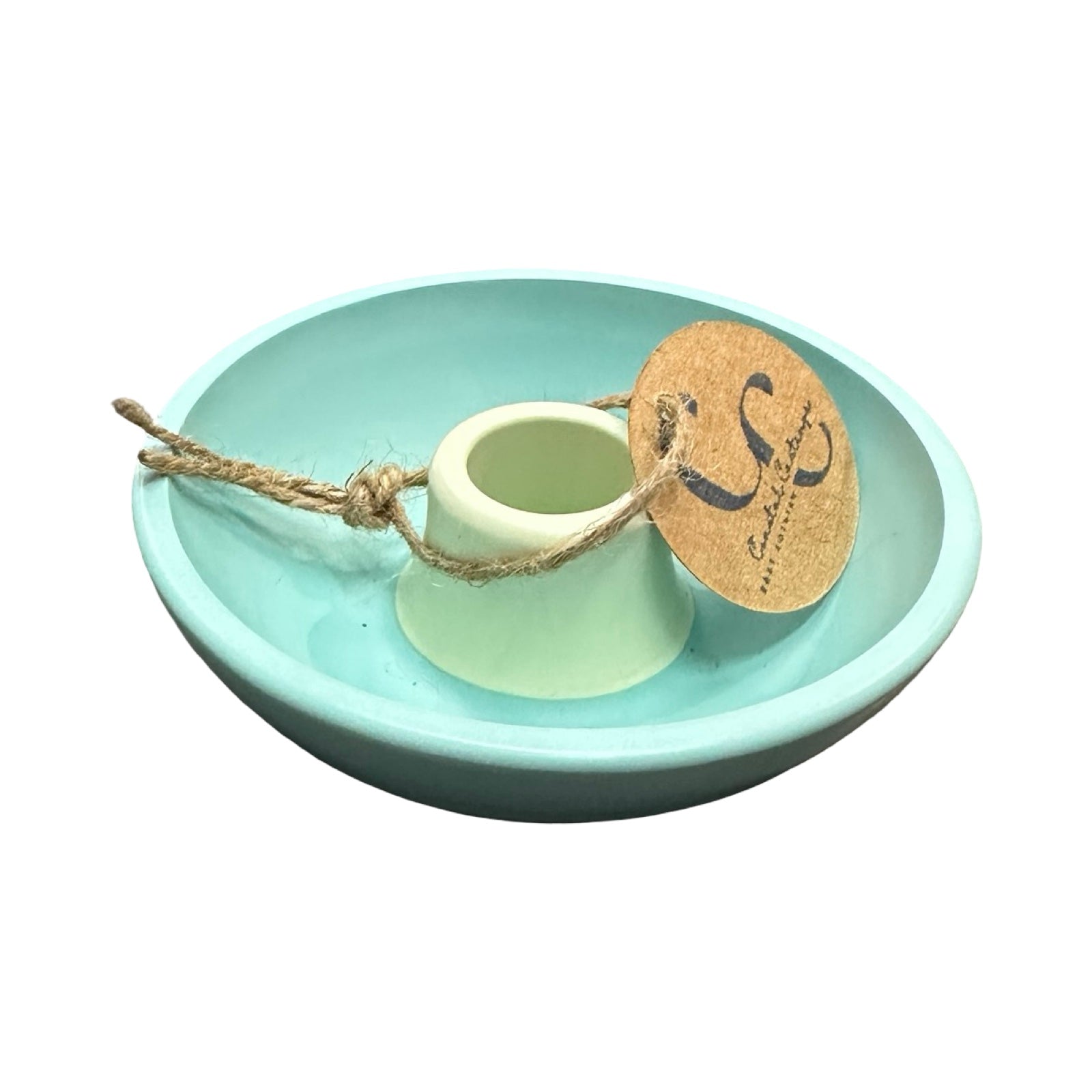 Turquoise and mint green candle holder with a tag.