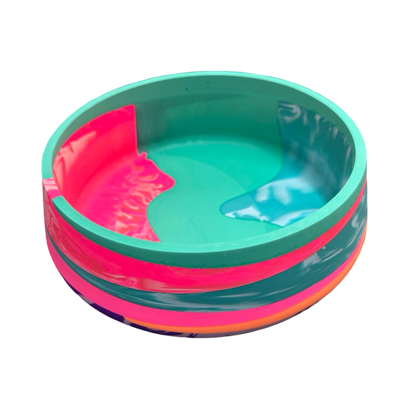 Colourful bowl with pink and green stripes on a white background.