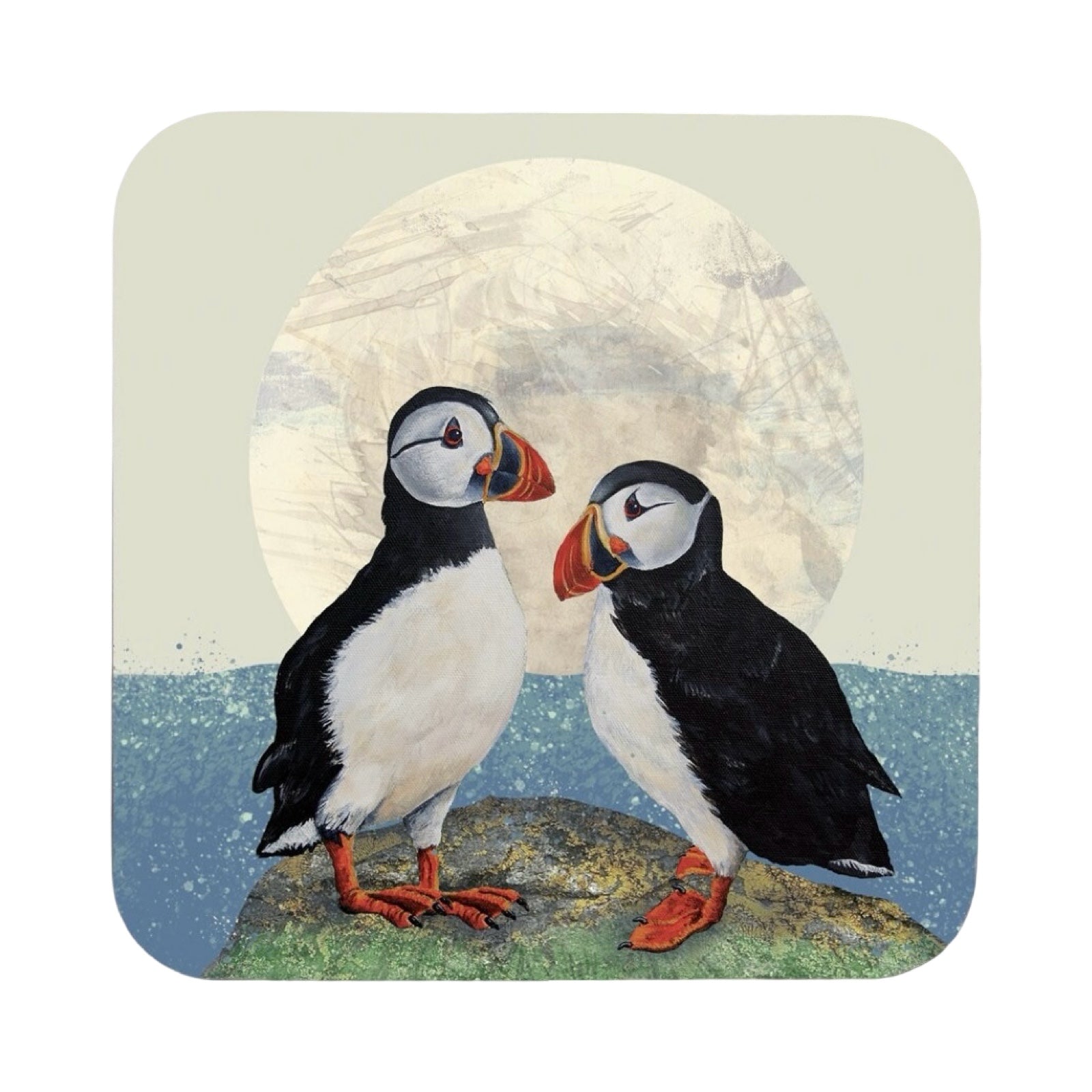 A coaster featuring an illustration of two puffins standing on the edge of a cliff.