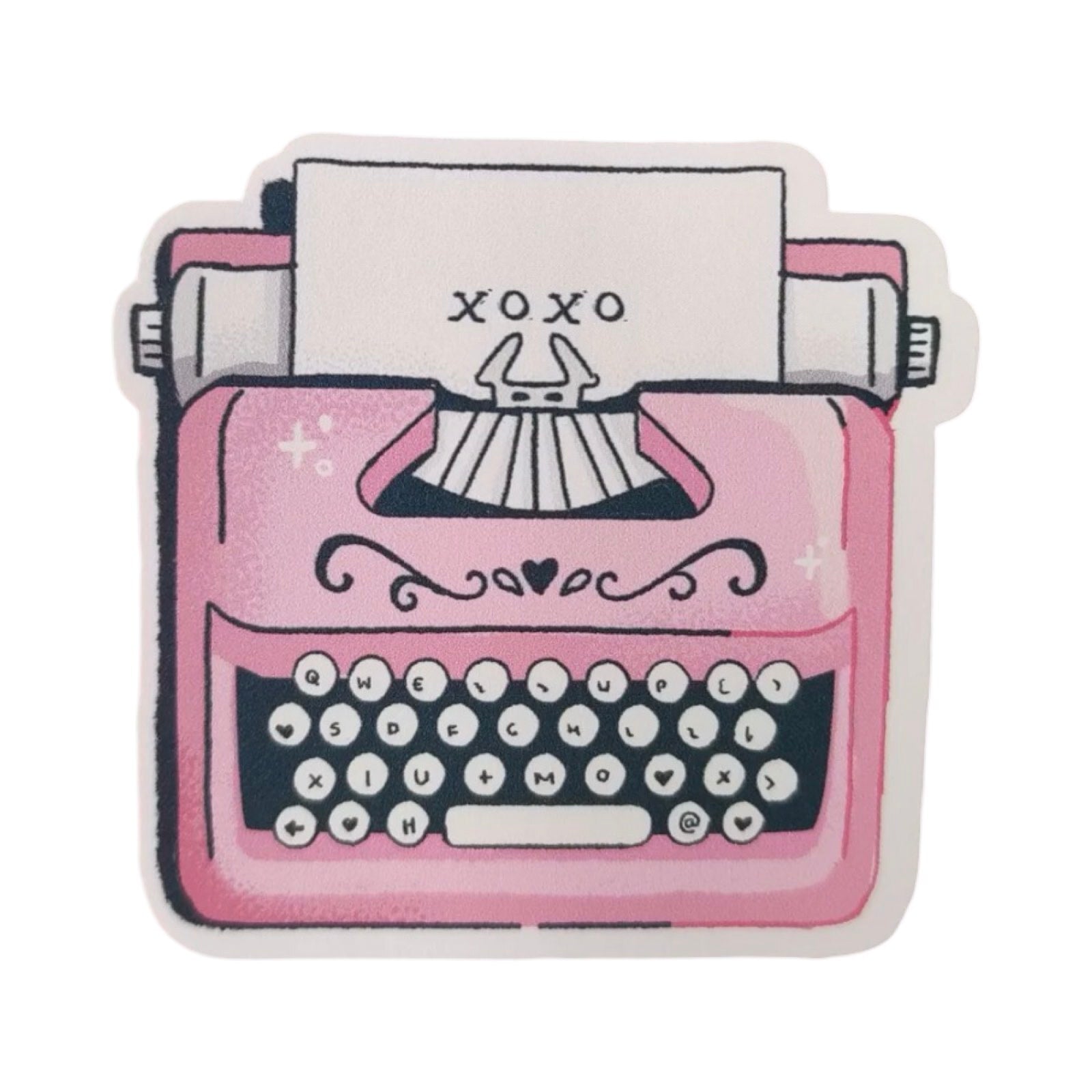 Sticker featuring an illustration of a pink typewriter with xoxo typed on a page.
