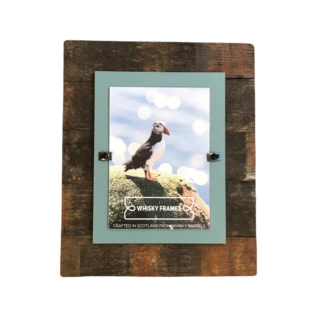 These Kiln photo frames will bring a pop of colour to your home against the wood of a reclaimed whisky barrel. 