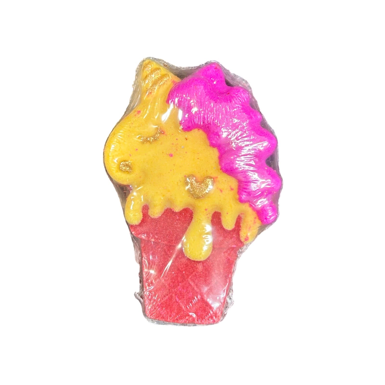 A small bath bomb shaped like a unicorn head with a pink and yellow horn, covered in clear plastic wrap, shown on a plain white background.