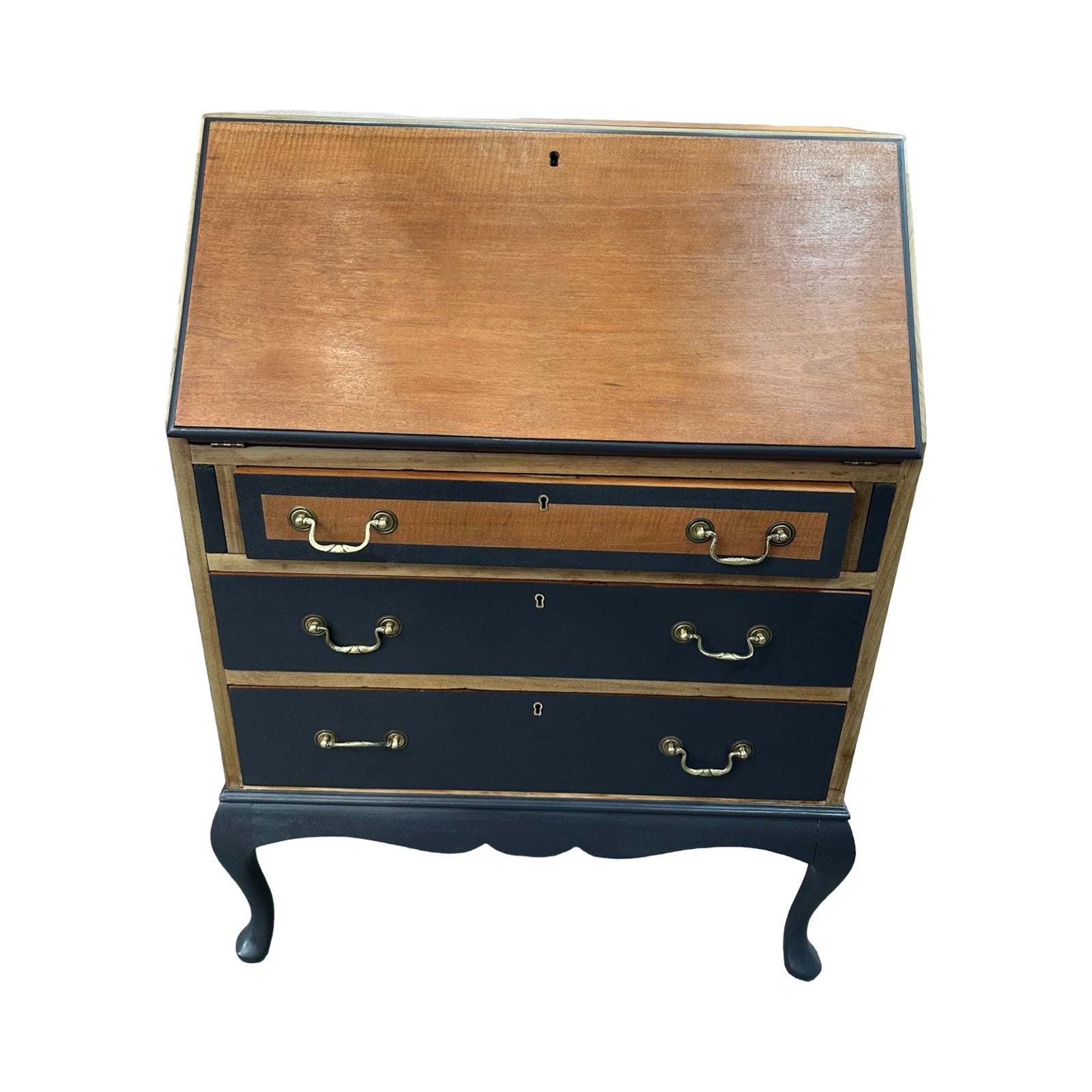 Wooden desk with black shelves on a white background.