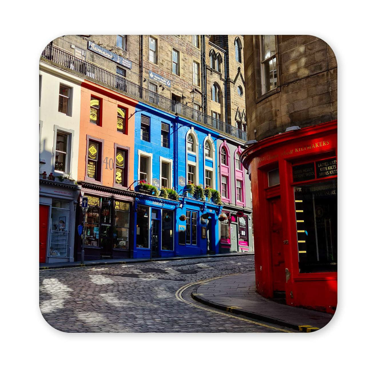 Colorful street coaster with buildings.