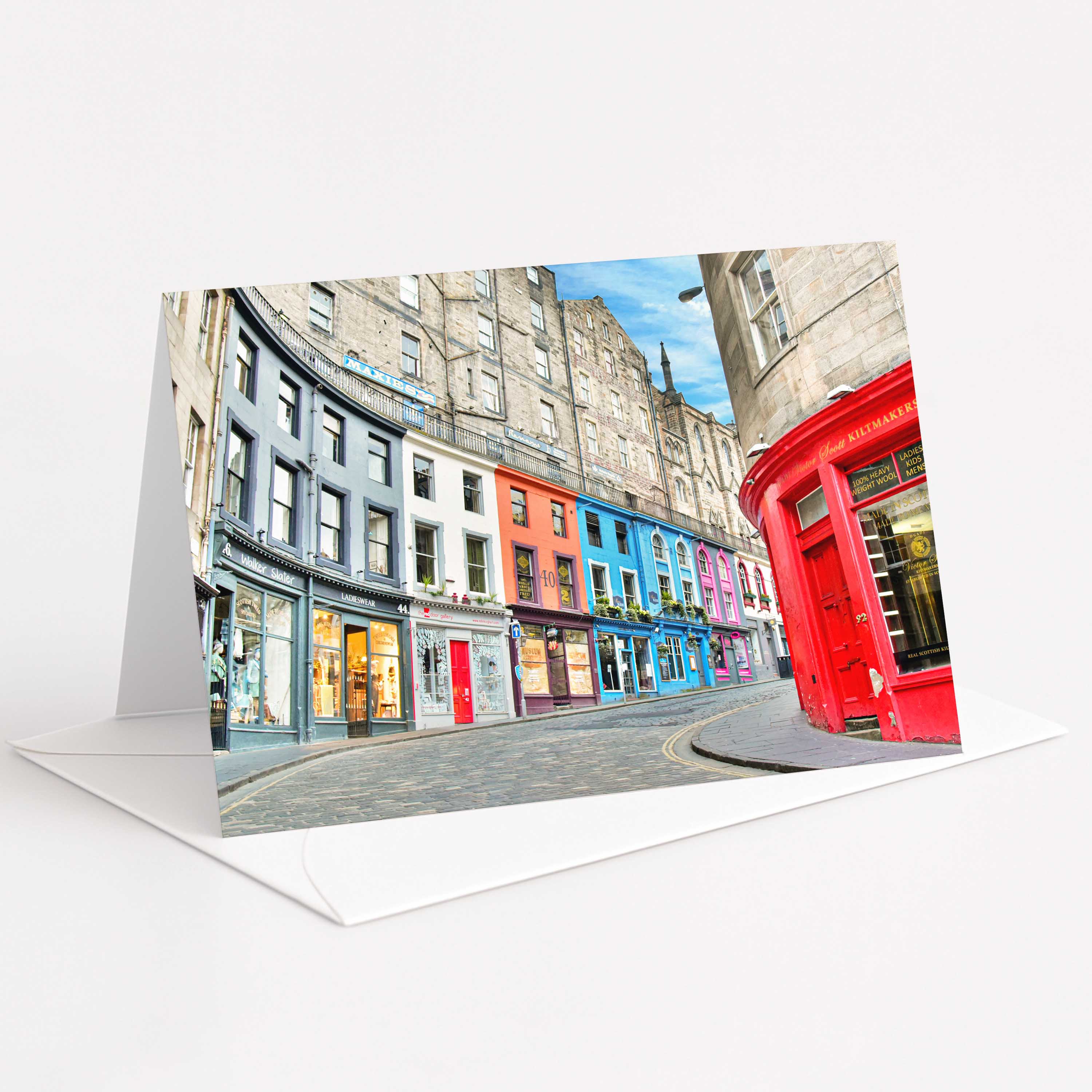 Greeting card with a colorful street scene .