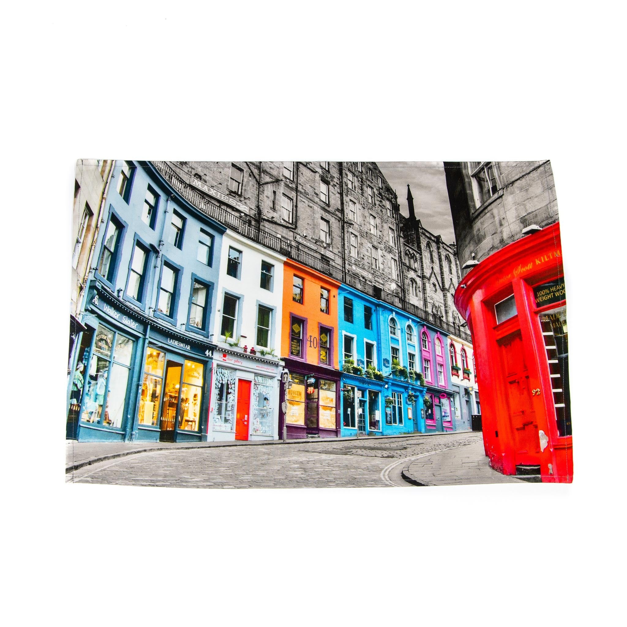 A colorful tea towel featuring a digital print of Victoria Street, Edinburgh, with a label and hanging loop sewn into the hem.