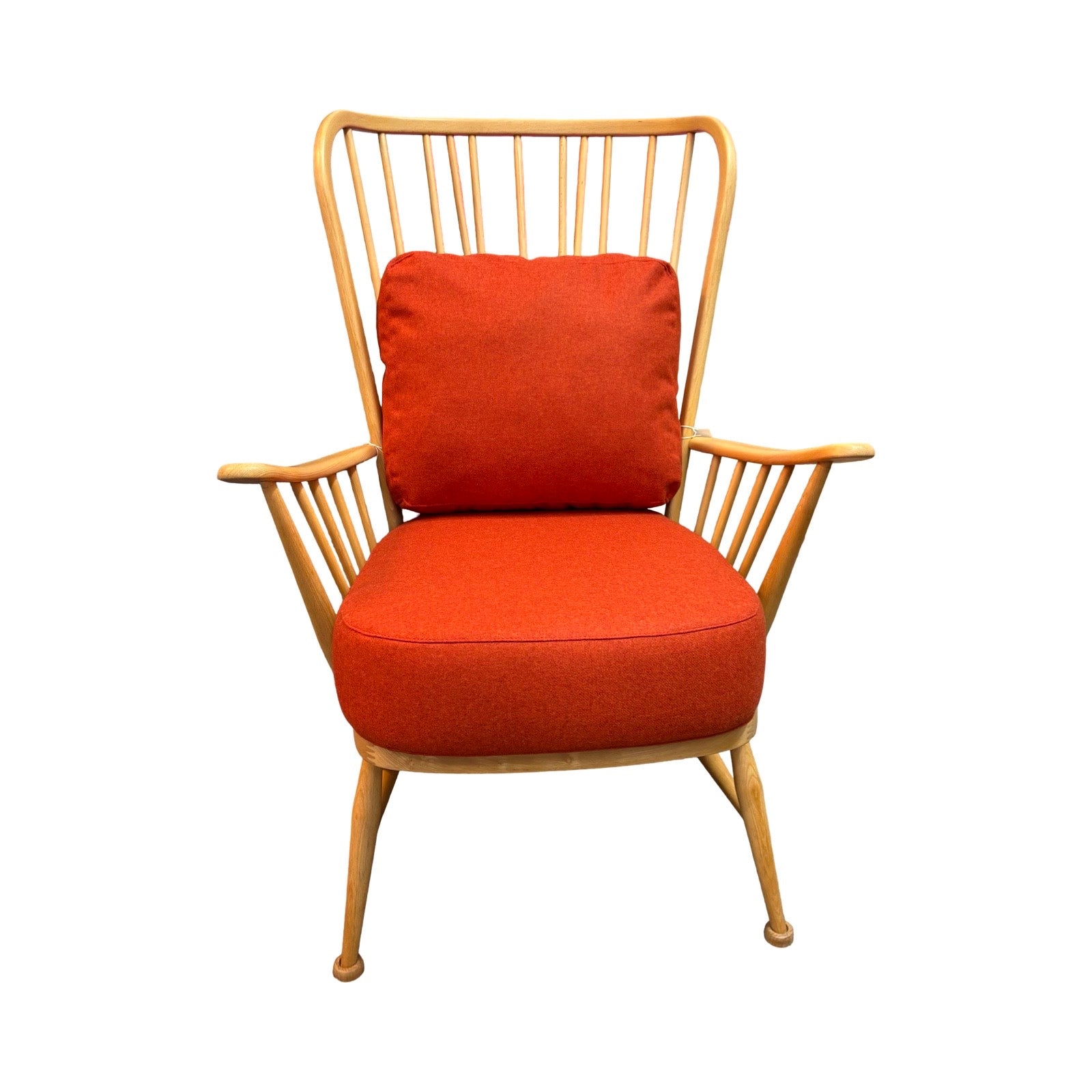 Chair with orange cushion and wooden frame on a white background.