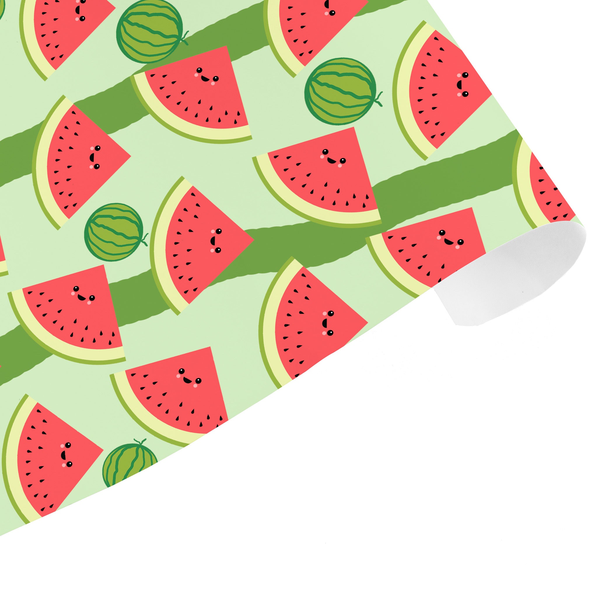 Wrapping paper with a pattern of smiling watermelons on a green background.