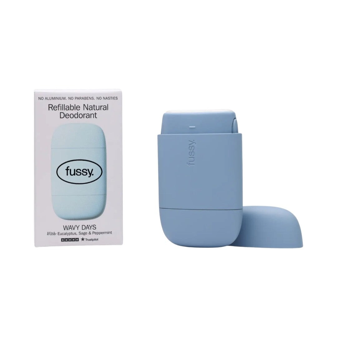 A blue refillable deodorant case and a packet of fussy wavy days refillable deodorant.