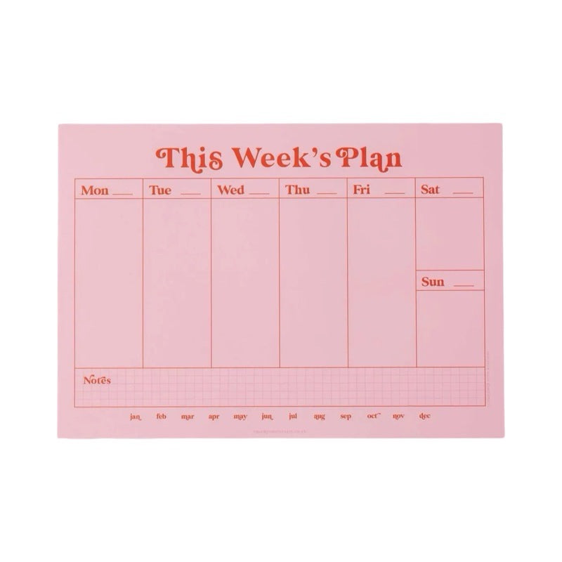 Weekly planner pad in pink and red.