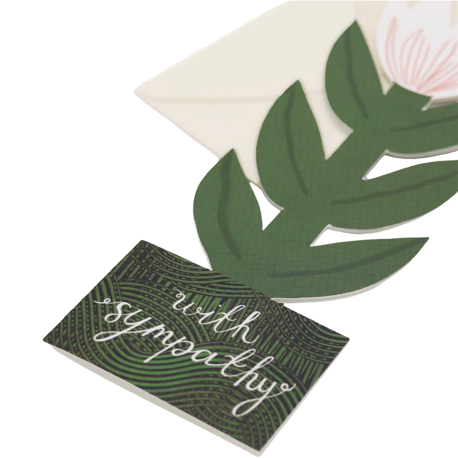 A floral-shaped card of a white lily with the text ‘With Sympathy’ on the base.