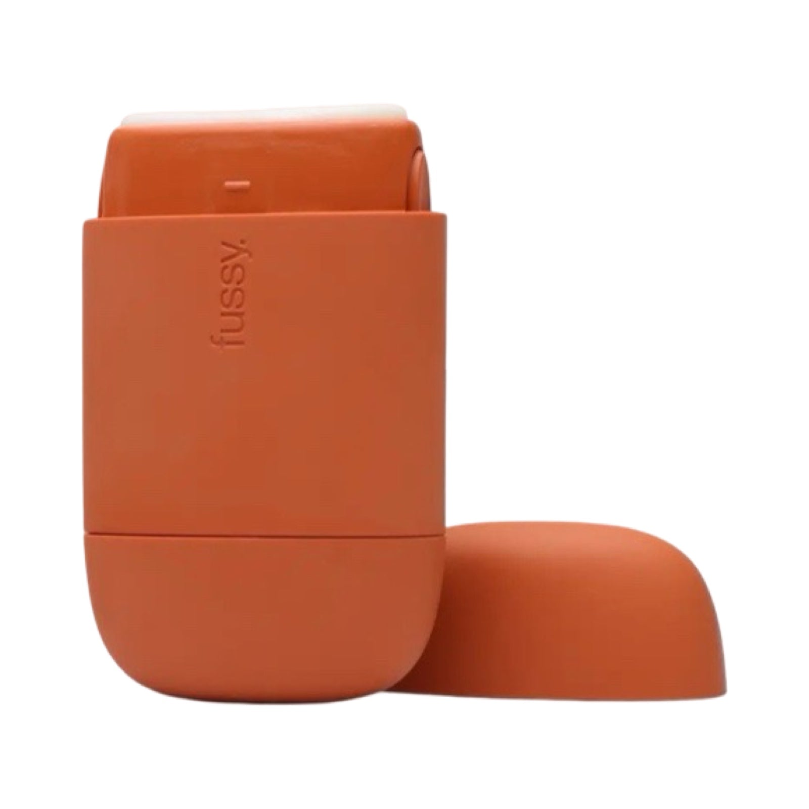 An orange refillable deodorant case with the lid off.