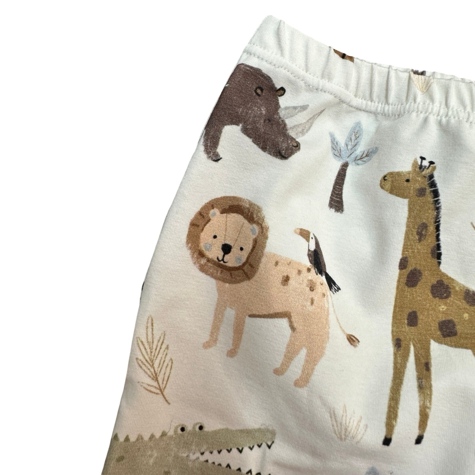 Children's pants with animal pattern on a white background.