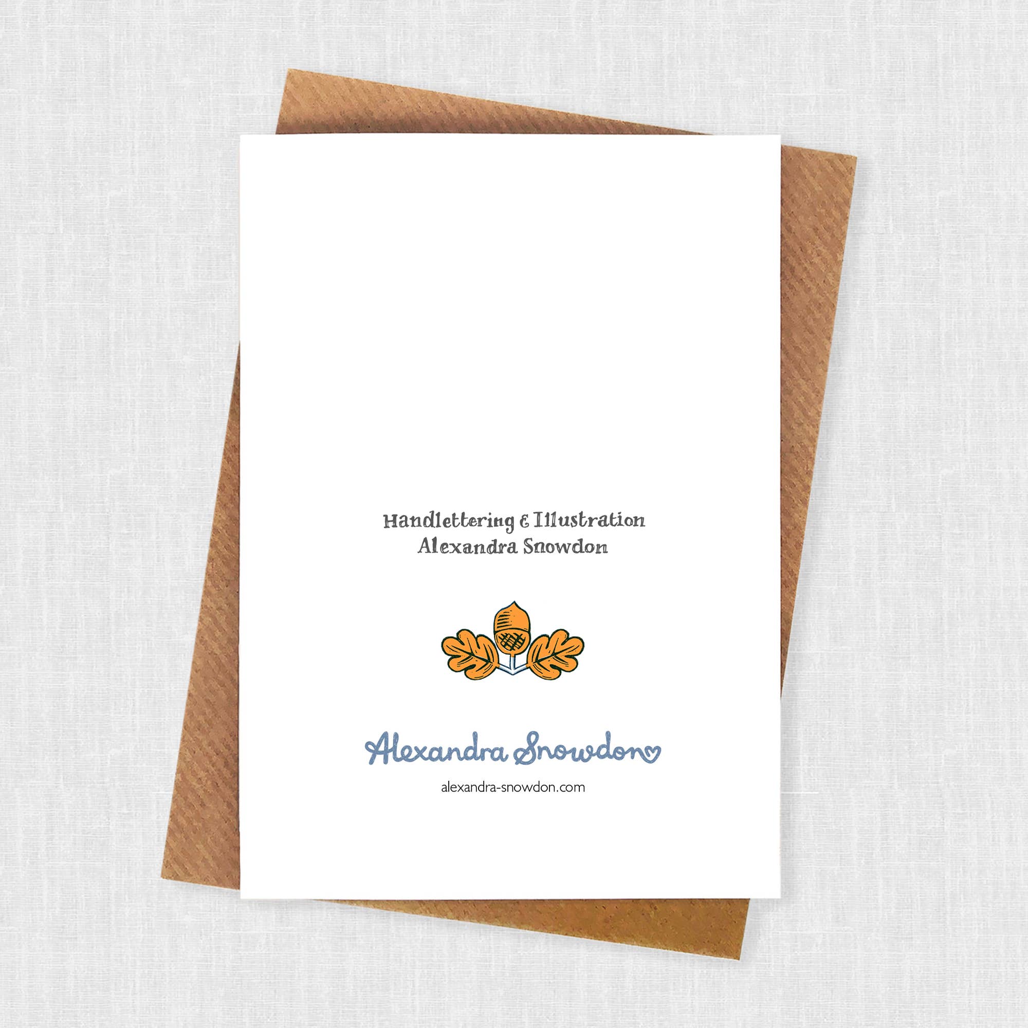 Card with branding details on a textured white background.