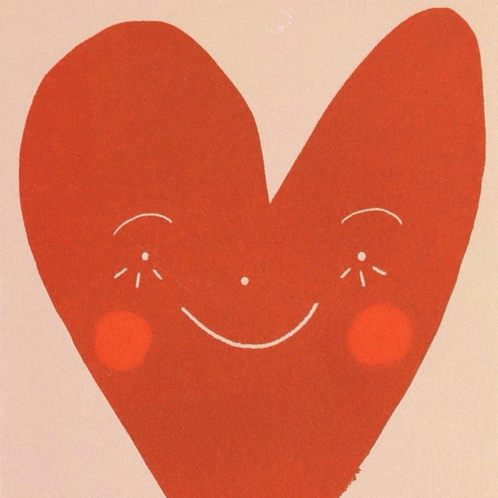 Card with a giant wonky red love heart in the centre with a smiling face and red rosy cheeks against a cream background